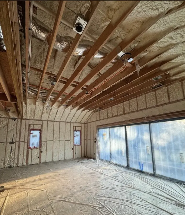 Interior walls and ceiling insulated with spray foam during new construction in Middle River